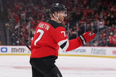 New Jersey Devils defenseman Dougie Hamilton celebrates goal during 2026 game.